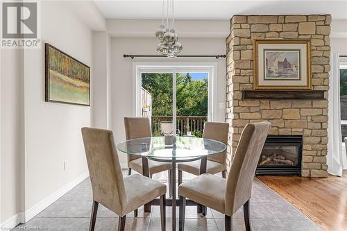 4131 Medland Drive, Burlington, ON - Indoor Photo Showing Dining Room With Fireplace