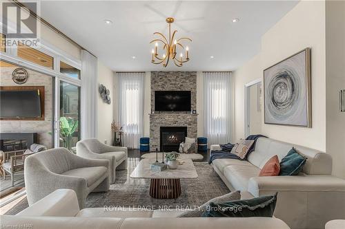 14 Tuscany Court, St. Catharines, ON - Indoor Photo Showing Living Room With Fireplace