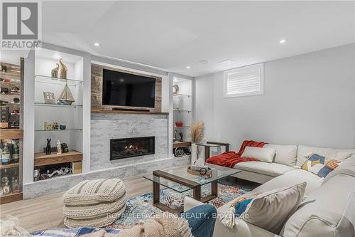 14 Tuscany Court, St. Catharines, ON - Indoor Photo Showing Living Room With Fireplace