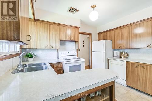 69 Orphir Road, Hamilton, ON - Indoor Photo Showing Kitchen With Double Sink