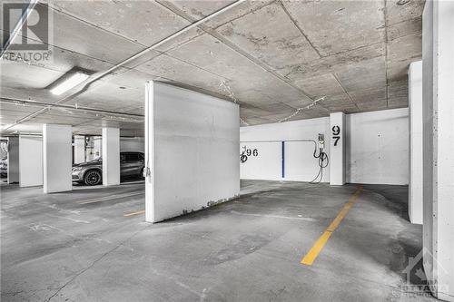 Oversized parking allowing additional small vehicle with EV charger - 108 Richmond Road Unit#612, Ottawa, ON - Indoor Photo Showing Garage