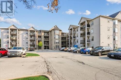 209 - 1411 Walker'S Line, Burlington, ON - Outdoor With Balcony With Facade