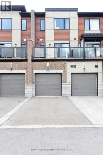 39 - 590 North Service Road, Hamilton, ON - Outdoor With Balcony With Facade