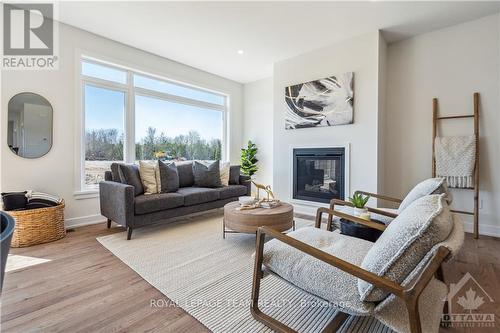 1261 Potter Drive, Brockville, ON - Indoor Photo Showing Living Room With Fireplace