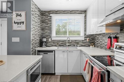 120 Quigley Road Unit# 55, Hamilton, ON - Indoor Photo Showing Kitchen With Double Sink