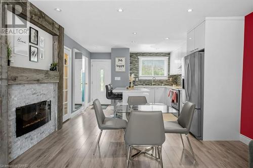 120 Quigley Road Unit# 55, Hamilton, ON - Indoor Photo Showing Dining Room With Fireplace