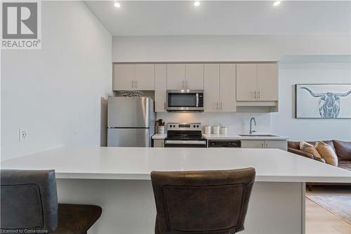 16 Concord Place Unit# 1002, Grimsby, ON - Indoor Photo Showing Kitchen