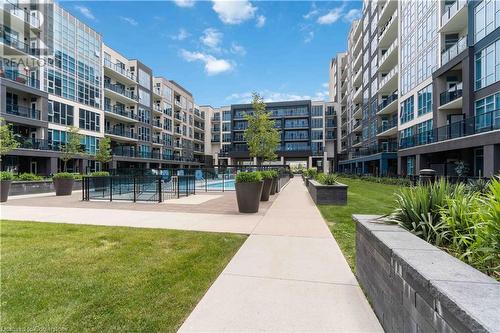 16 Concord Place Unit# 1002, Grimsby, ON - Outdoor With Balcony With Facade