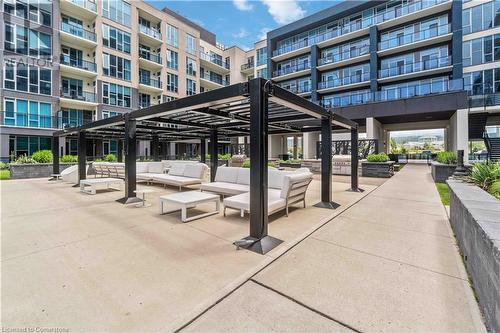 16 Concord Place Unit# 1002, Grimsby, ON - Outdoor With Balcony With Facade