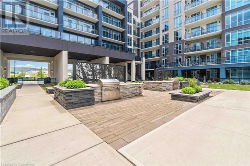 16 Concord Place Unit# 1002, Grimsby, ON - Outdoor With Balcony With Facade