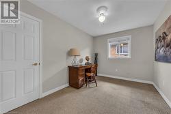 Main floor bedroom, currently used as den - 