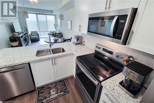 2750 King Street E Unit# 515, Hamilton, ON - Indoor Photo Showing Kitchen With Double Sink