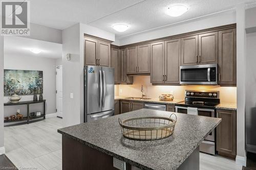 620 Sauve Street Unit# 315, Milton, ON - Indoor Photo Showing Kitchen With Upgraded Kitchen