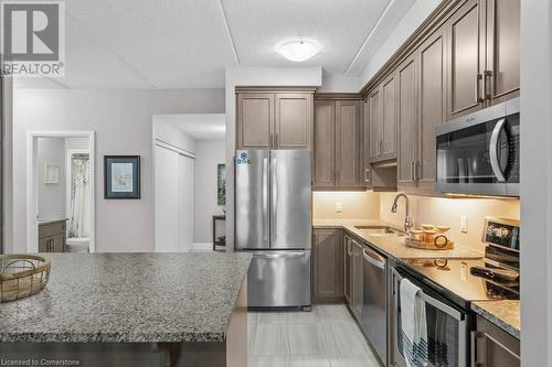 620 Sauve Street Unit# 315, Milton, ON - Indoor Photo Showing Kitchen With Upgraded Kitchen