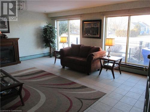 485 Thorold Road Unit# 321, Welland, ON - Indoor Photo Showing Living Room With Fireplace