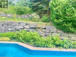 Armour stone tiered backyard - 