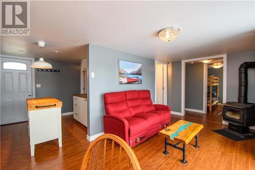 90 Pascal Road, Aldouane, NB - Indoor Photo Showing Living Room With Fireplace