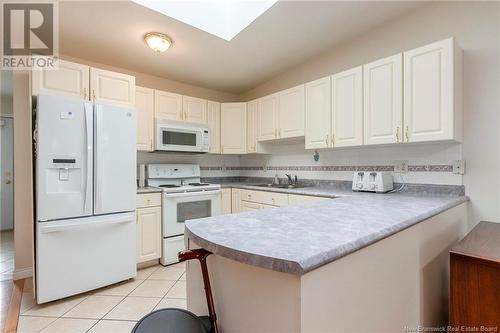 4 Saint Peters Court, Saint John, NB - Indoor Photo Showing Kitchen With Double Sink