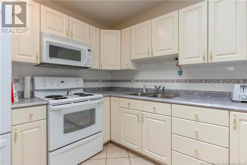 4 Saint Peters Court, Saint John, NB - Indoor Photo Showing Kitchen With Double Sink