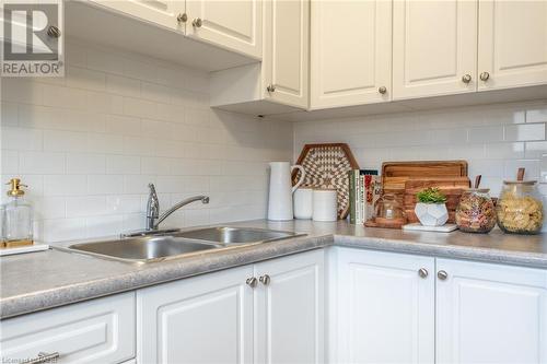 27 Woodman Drive N, Hamilton, ON - Indoor Photo Showing Kitchen With Double Sink