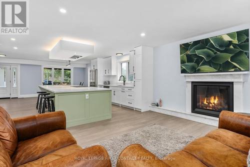 30 Golf Course Road, Bracebridge, ON - Indoor Photo Showing Living Room With Fireplace