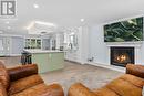 30 Golf Course Road, Bracebridge, ON  - Indoor Photo Showing Living Room With Fireplace 