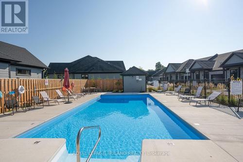 13 - 63 Compass Trail, Central Elgin (Port Stanley), ON - Outdoor With In Ground Pool