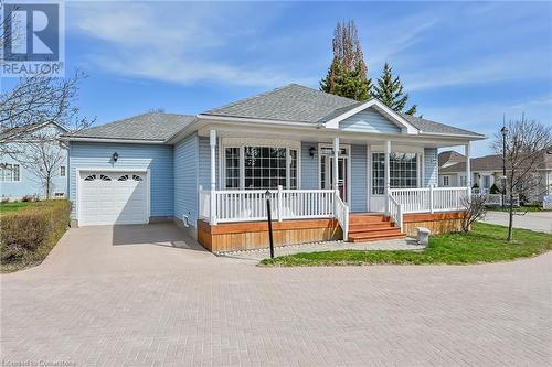 front view of bungalow and attached garage - 244 Silverbirch Boulevard, Mount Hope, ON - Outdoor With Deck Patio Veranda With Facade