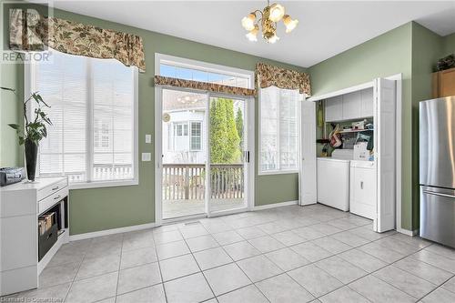 eat in kitchen with laundry in closet - 244 Silverbirch Boulevard, Mount Hope, ON - Indoor