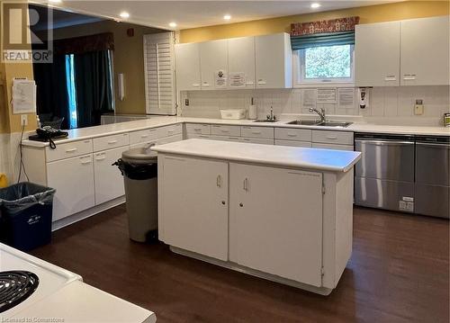 club house event room kitchen - 244 Silverbirch Boulevard, Mount Hope, ON - Indoor Photo Showing Kitchen With Double Sink