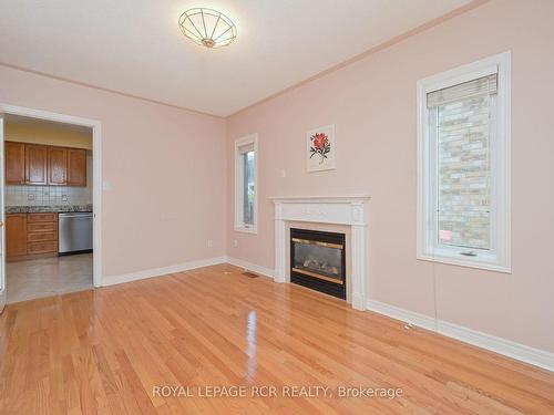 344 Landsbridge St, Caledon, ON - Indoor Photo Showing Living Room With Fireplace