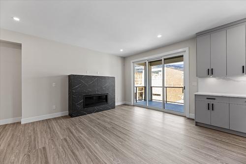 1682 Harbour View Crescent, West Kelowna, BC - Indoor Photo Showing Living Room With Fireplace