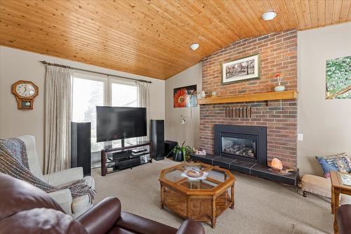 2189 Michelle Crescent, West Kelowna, BC - Indoor Photo Showing Living Room With Fireplace