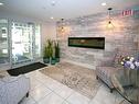 110-3221 Centennial Drive, Vernon, BC  - Indoor Photo Showing Living Room With Fireplace 