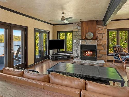 Salon - 4855 Ch. Du Lac-Théodore, Morin-Heights, QC - Indoor Photo Showing Living Room With Fireplace