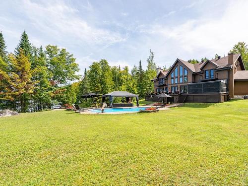 Vue d'ensemble - 4855 Ch. Du Lac-Théodore, Morin-Heights, QC - Outdoor With In Ground Pool With Deck Patio Veranda