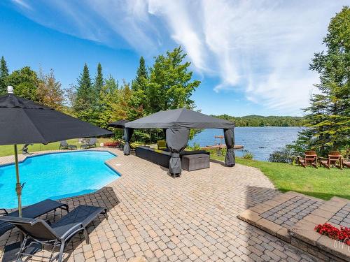 Vue sur l'eau - 4855 Ch. Du Lac-Théodore, Morin-Heights, QC - Outdoor With In Ground Pool