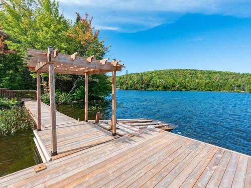 Bord de l'eau - 4855 Ch. Du Lac-Théodore, Morin-Heights, QC - Outdoor With Body Of Water With Deck Patio Veranda