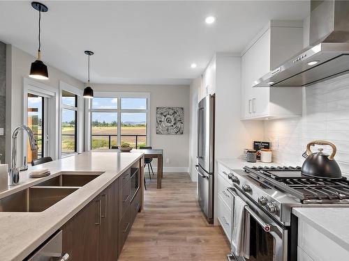 502-2520 Hackett Cres, Central Saanich, BC - Indoor Photo Showing Kitchen With Stainless Steel Kitchen With Double Sink With Upgraded Kitchen