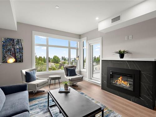 307-2520 Hackett Cres, Central Saanich, BC - Indoor Photo Showing Living Room With Fireplace