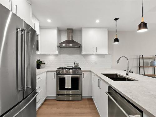 307-2520 Hackett Cres, Central Saanich, BC - Indoor Photo Showing Kitchen With Stainless Steel Kitchen With Double Sink With Upgraded Kitchen