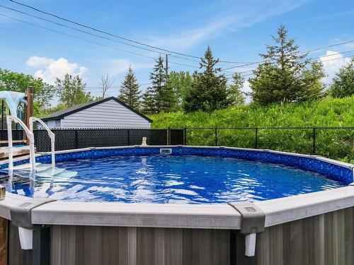 Pool - 292 Rue Capes, Saint-Constant, QC - Outdoor With Above Ground Pool With Backyard