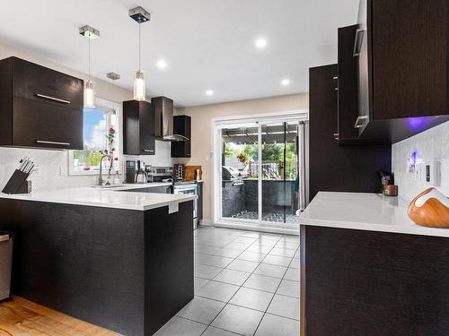 Kitchen - 292 Rue Capes, Saint-Constant, QC - Indoor Photo Showing Kitchen With Upgraded Kitchen