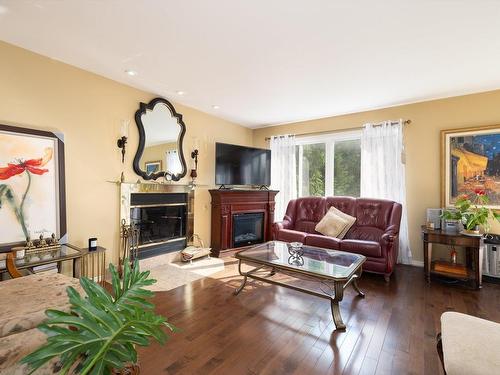 Salon - 485 Rue D'Aubervilliers, Terrebonne (Terrebonne), QC - Indoor Photo Showing Living Room With Fireplace