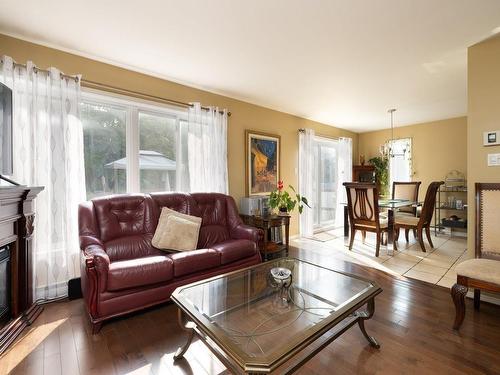 Salon - 485 Rue D'Aubervilliers, Terrebonne (Terrebonne), QC - Indoor Photo Showing Living Room With Fireplace