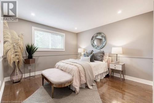 Large Bedrooms with hardwood floors & LED potlights. - 2182 Maplewood Drive, Burlington, ON - Indoor Photo Showing Bedroom