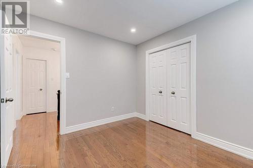 Bedroom 2 w/hardwood & LED Potlights - 2182 Maplewood Drive, Burlington, ON - Indoor Photo Showing Other Room