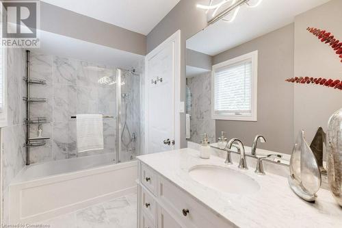 Luxe updated Main Bath 2023 w/Designer Tile & Lighting - 2182 Maplewood Drive, Burlington, ON - Indoor Photo Showing Bathroom