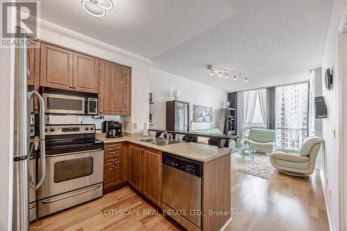 2006 - 220 Burnhamthorpe Road W, Mississauga, ON - Indoor Photo Showing Kitchen With Double Sink