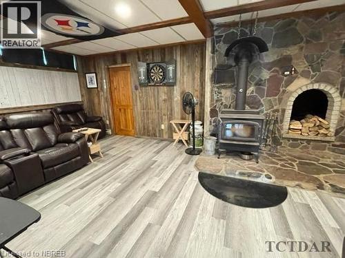 452 Highway 65, Elk Lake, ON - Indoor With Fireplace